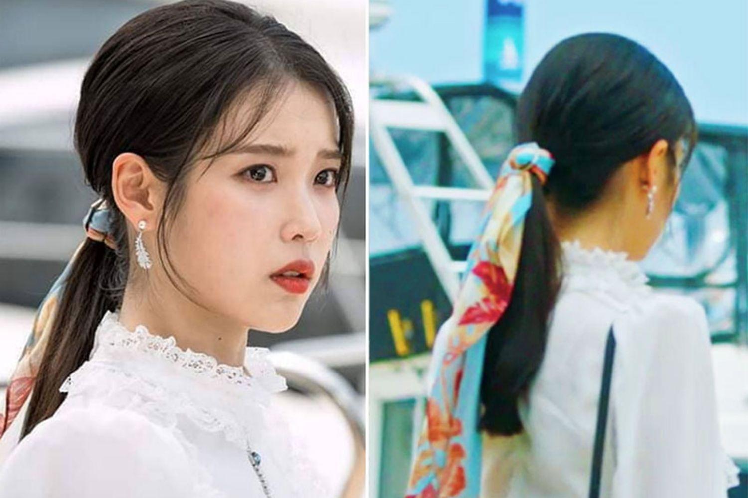 Hai phụ nữ với kiểu tóc buộc thấp sử dụng ruy băng. Một người dùng ruy băng xanh nhạt, người thứ hai có búi tóc buộc bằng ruy băng hoa văn màu sắc.