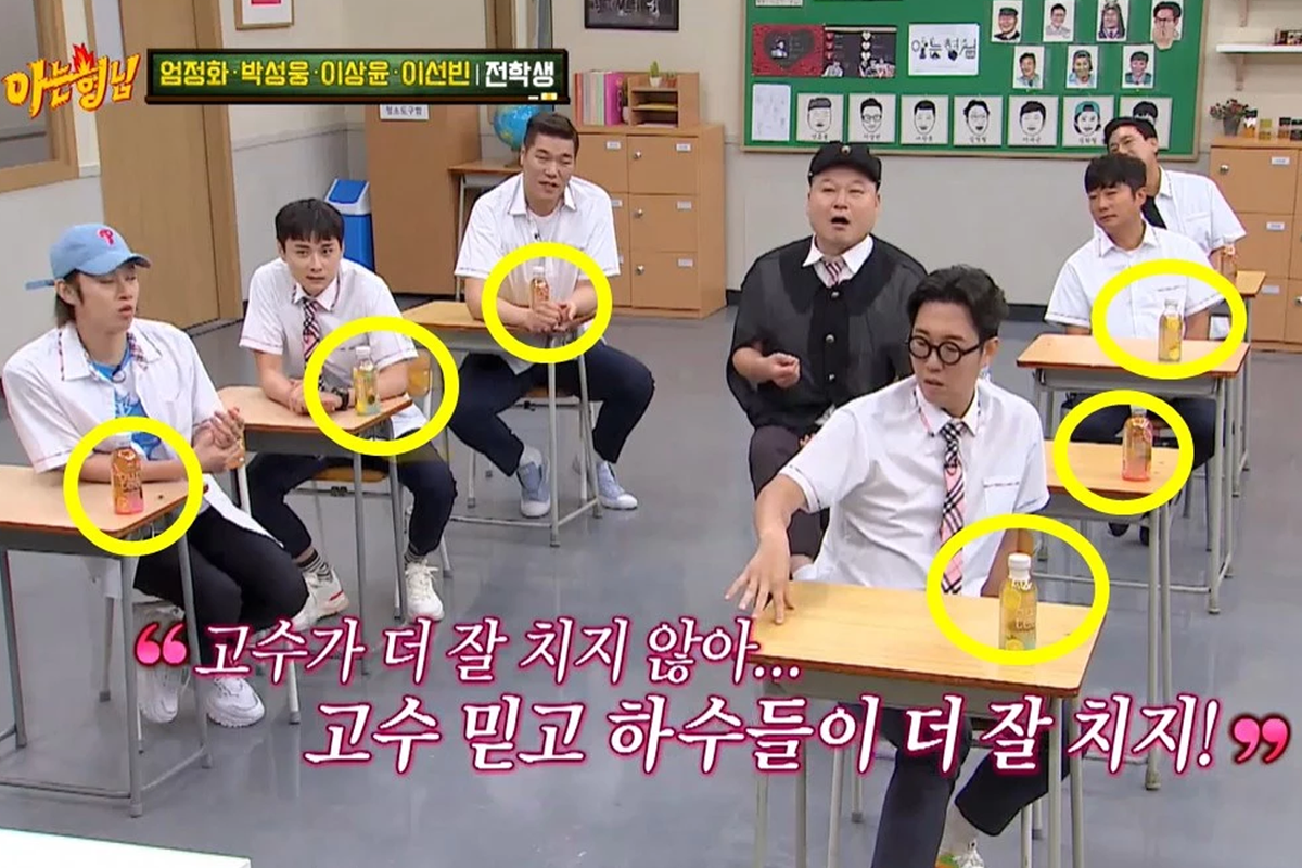 knowing bros korean variety show with cast members with product placement drinks on desk