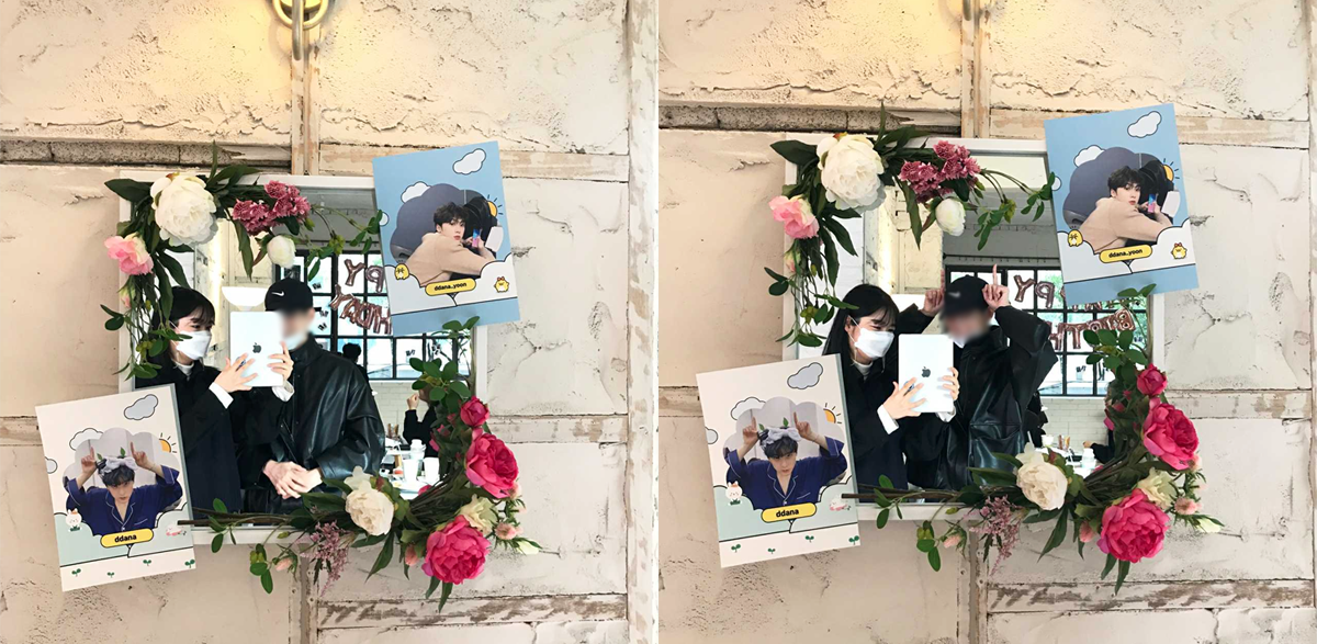 韓國GIFTED咖啡廳內使用的應援產品展示，桌面上擺放著尹產賀的商品和卡片。