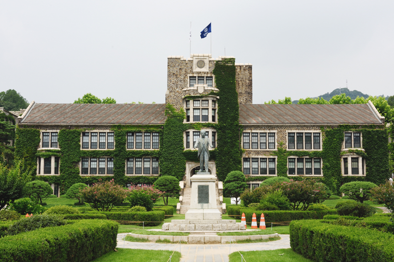 Aerial view of a densely packed urban area showing the high apartment buildings lined closely together in a Seoul neighborhood.