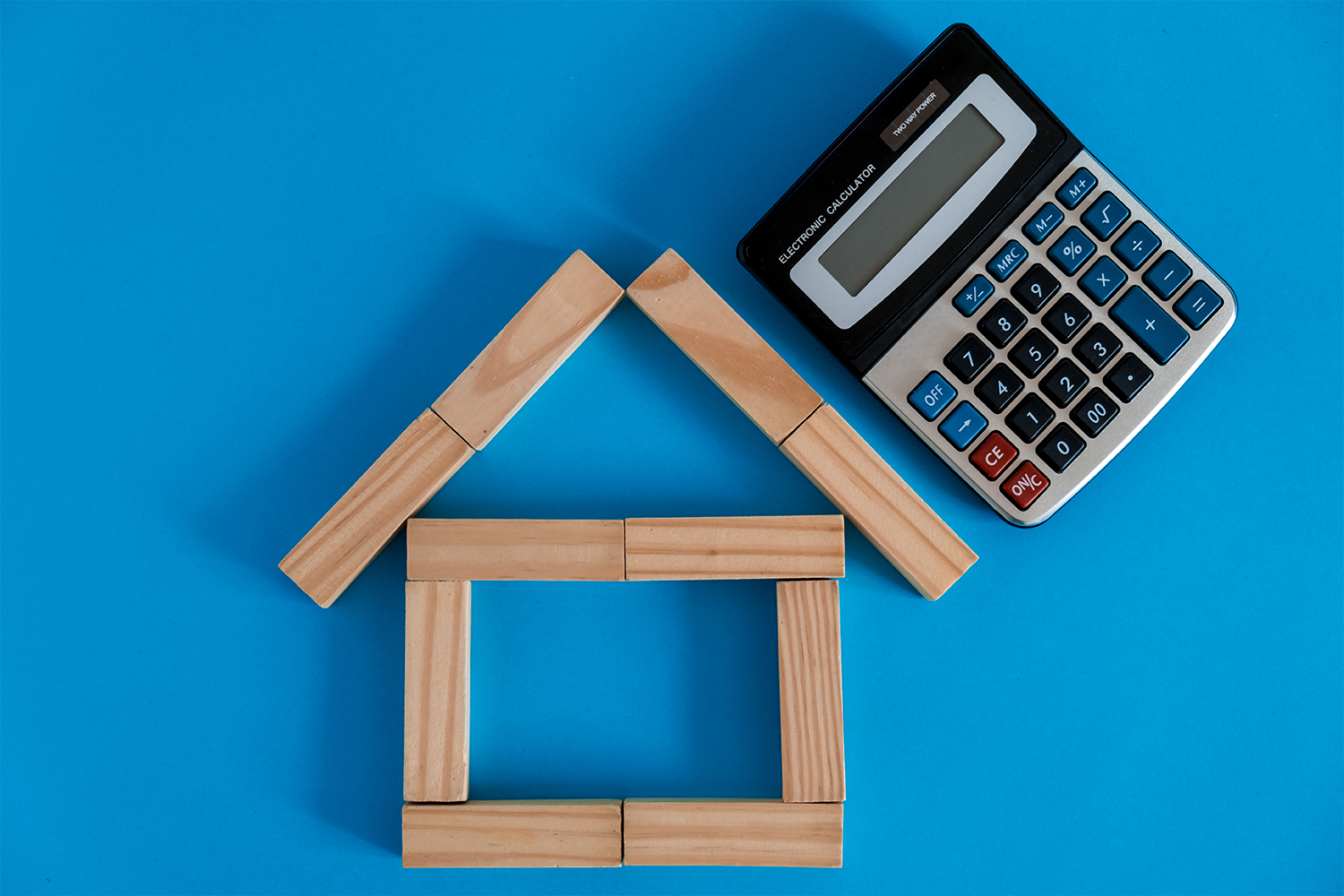 A bag full of Korean ingredients against a white fabric, showing a collection of everyday groceries needed for solo living in Korea.