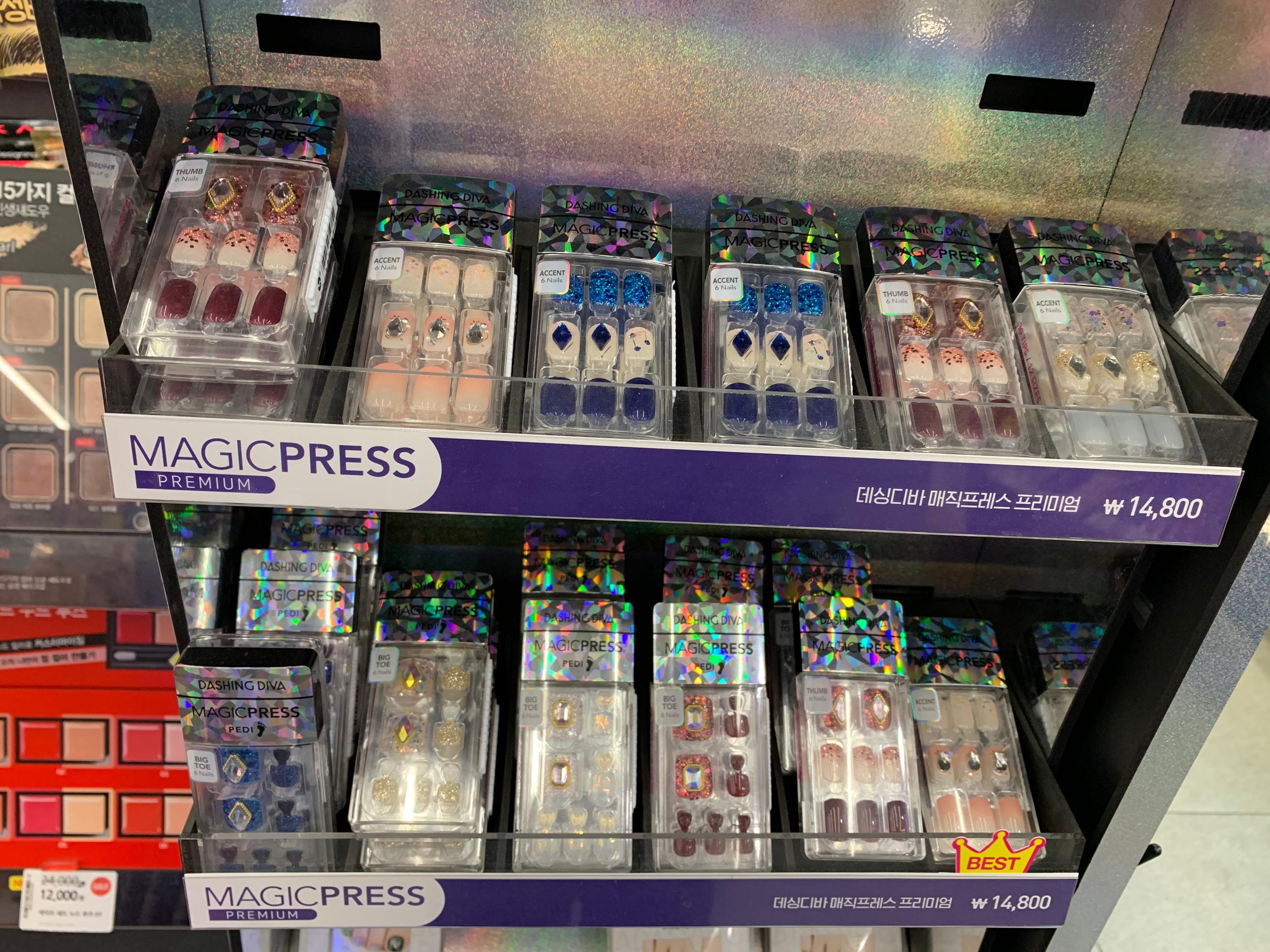 selection of dashing dive magic press, pree-on nails with jewel studs at olive young