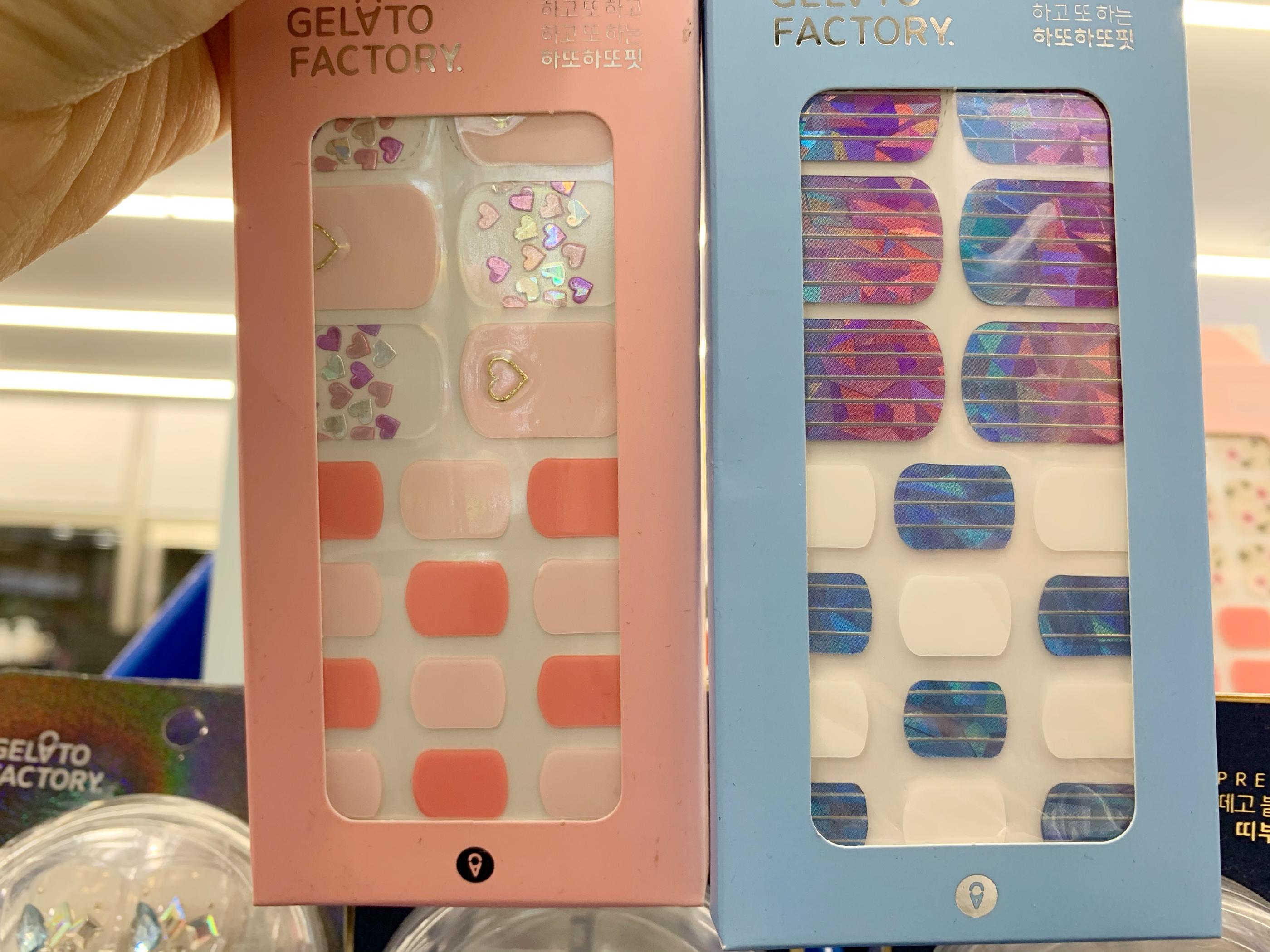 gelato factory nail stickers at olive young, on pink with colored hearts, another blue with metallic effect