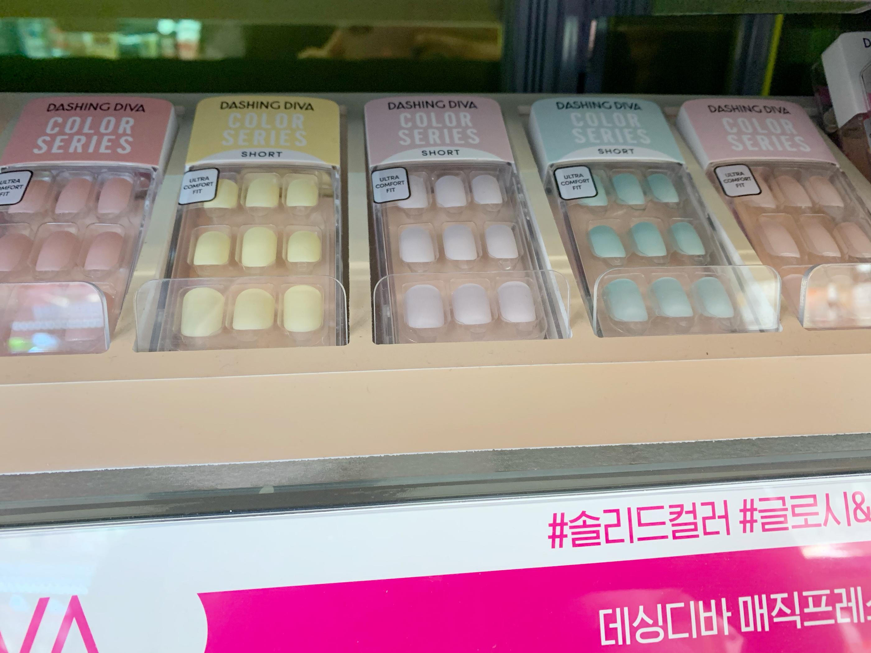 dashing diva color series press-on nails in pink, yellow, purple, blue and light pink at olive young