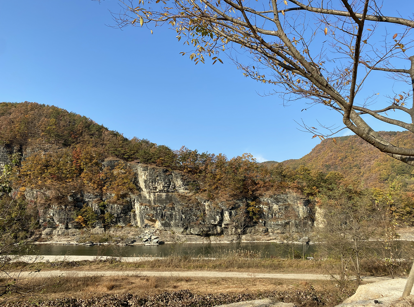 Cliff and shallow lake view seen from Nongam Jongtaek, Andong