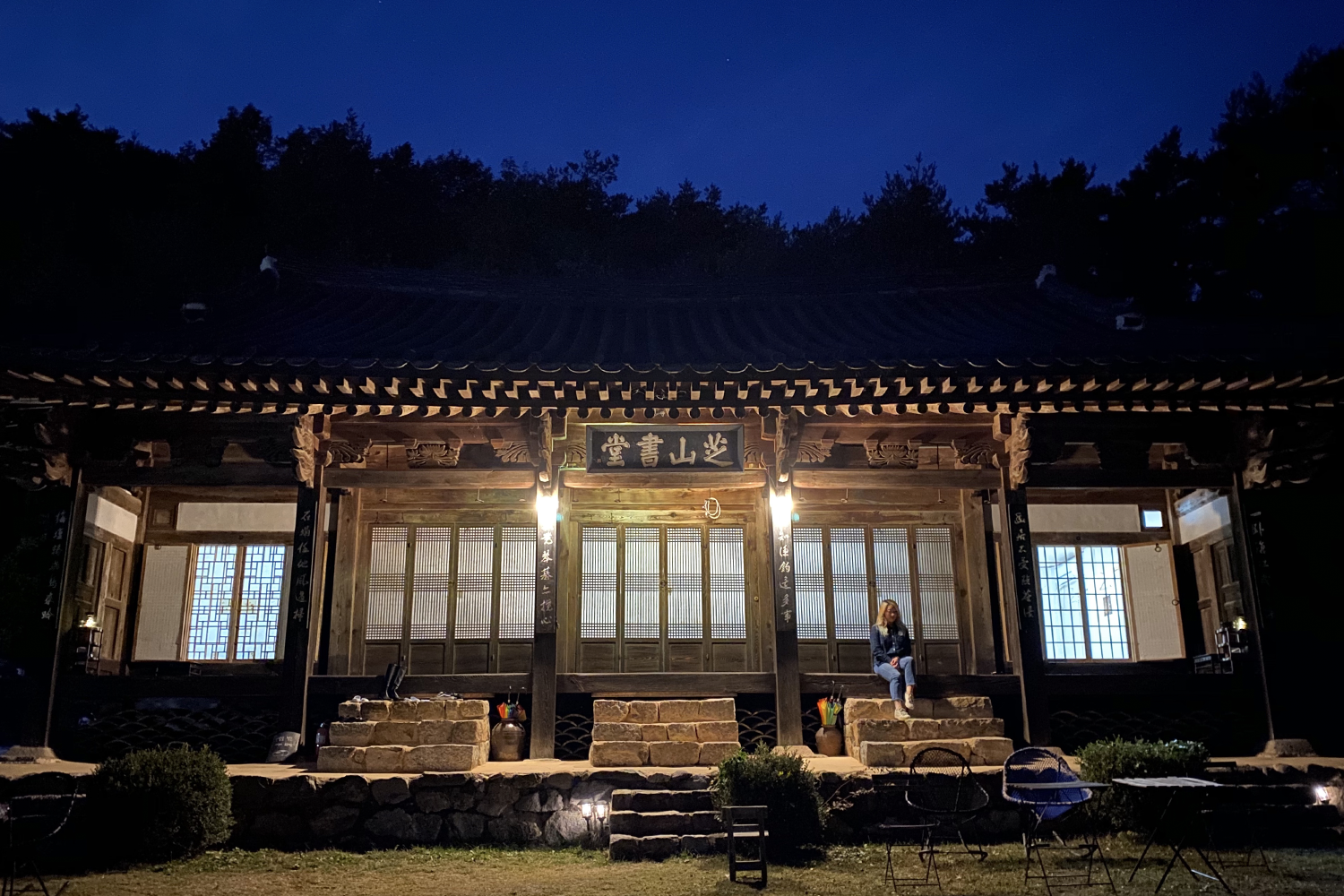 Jirye Arts Village hanok building with lights on at night