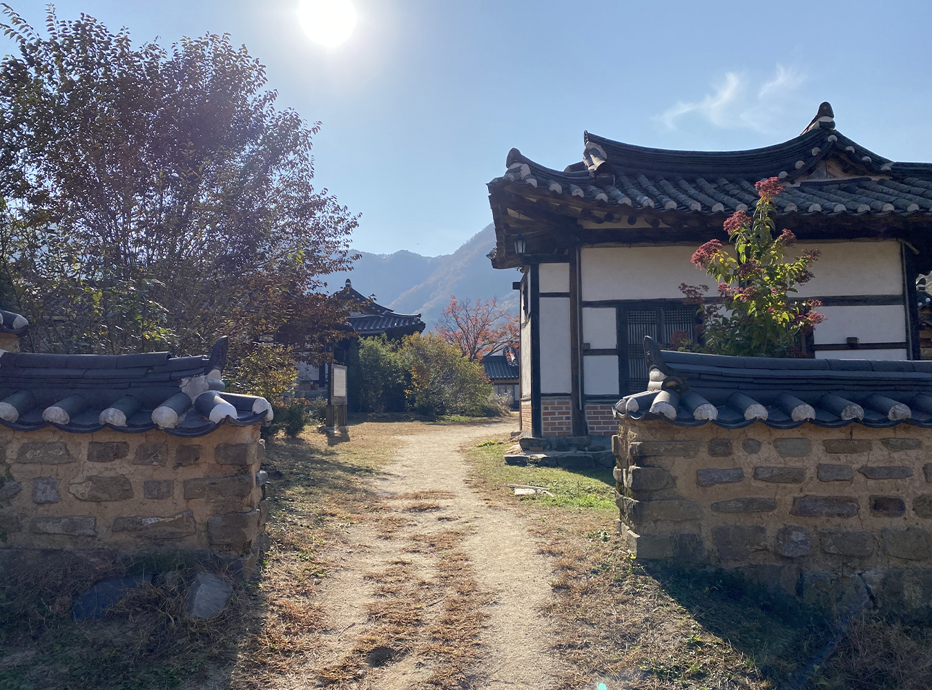 Nongam Jongtaek view of the trail and a traditional building