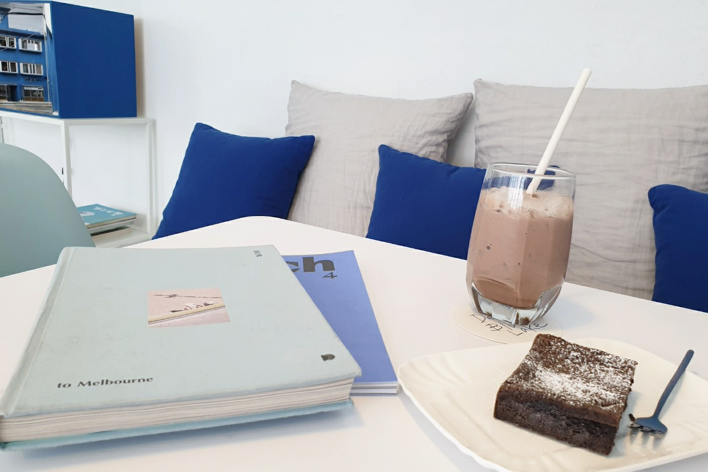 drinks and book on table DEEP BLUE LAKE