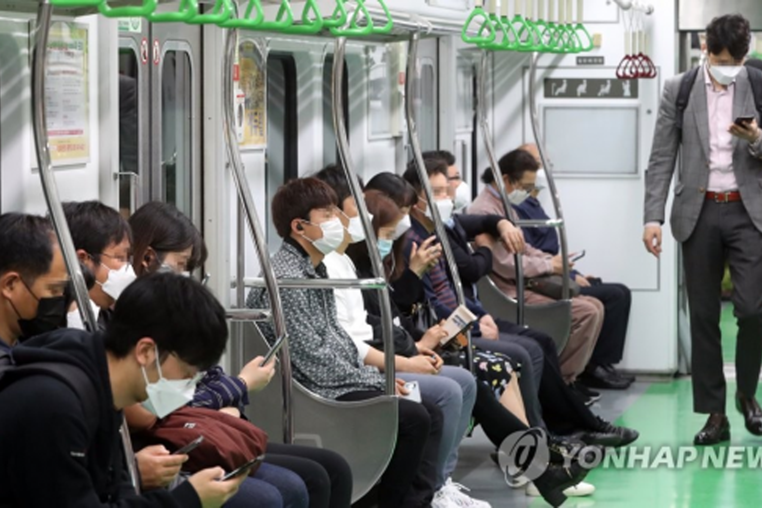 People sitting in subway in korea