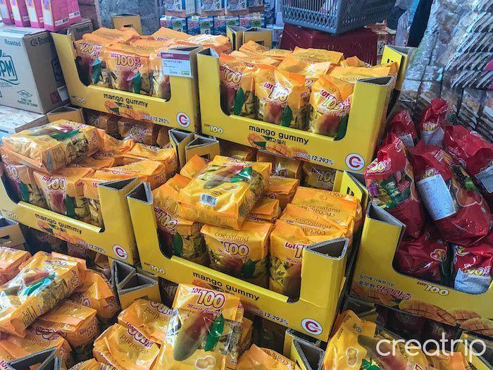 Shelves stacked with different flavors of 3點一刻 milk tea at TAIWAN CAFE in Gangnam, Seoul.