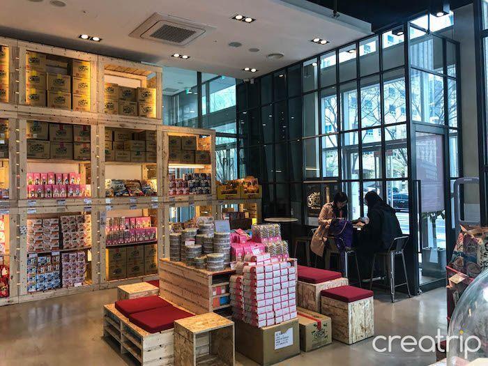 Display of Taiwanese snacks at TAIWAN CAFE in Gangnam, Seoul, highlighting popular milk tea brands.