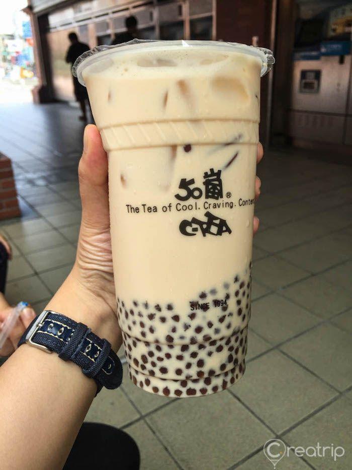 Close-up view of a freshly served milk tea from a renowned Taiwanese brand in Gangnam, Seoul.
