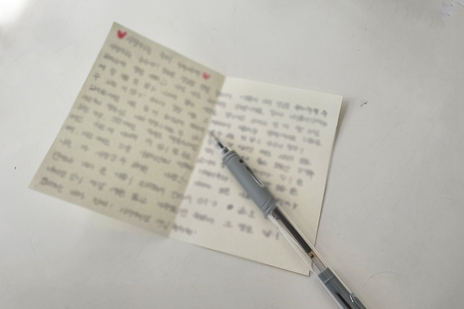 blurred handwritten letter