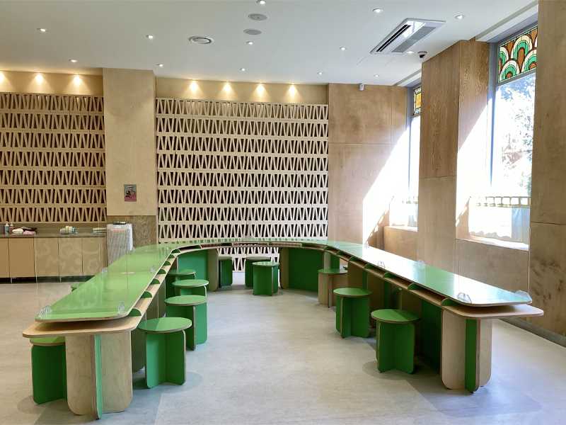 cafe knotted coex samseong branch with green tables and green round stools with light wooden finish