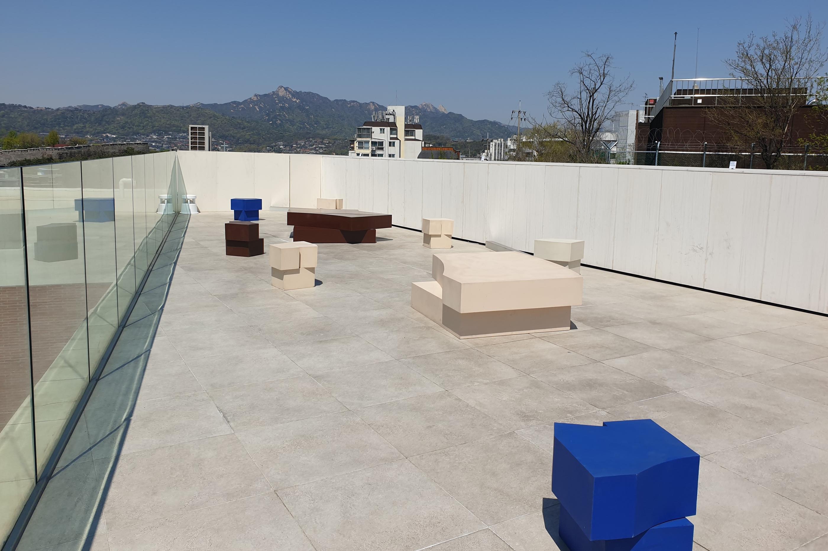 seats outside T(ER)T(RE) rooftop