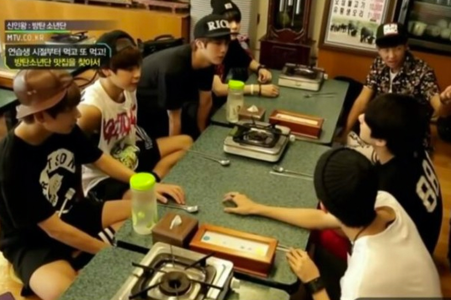 bts members sitting at tables at Yoojung Sikdang