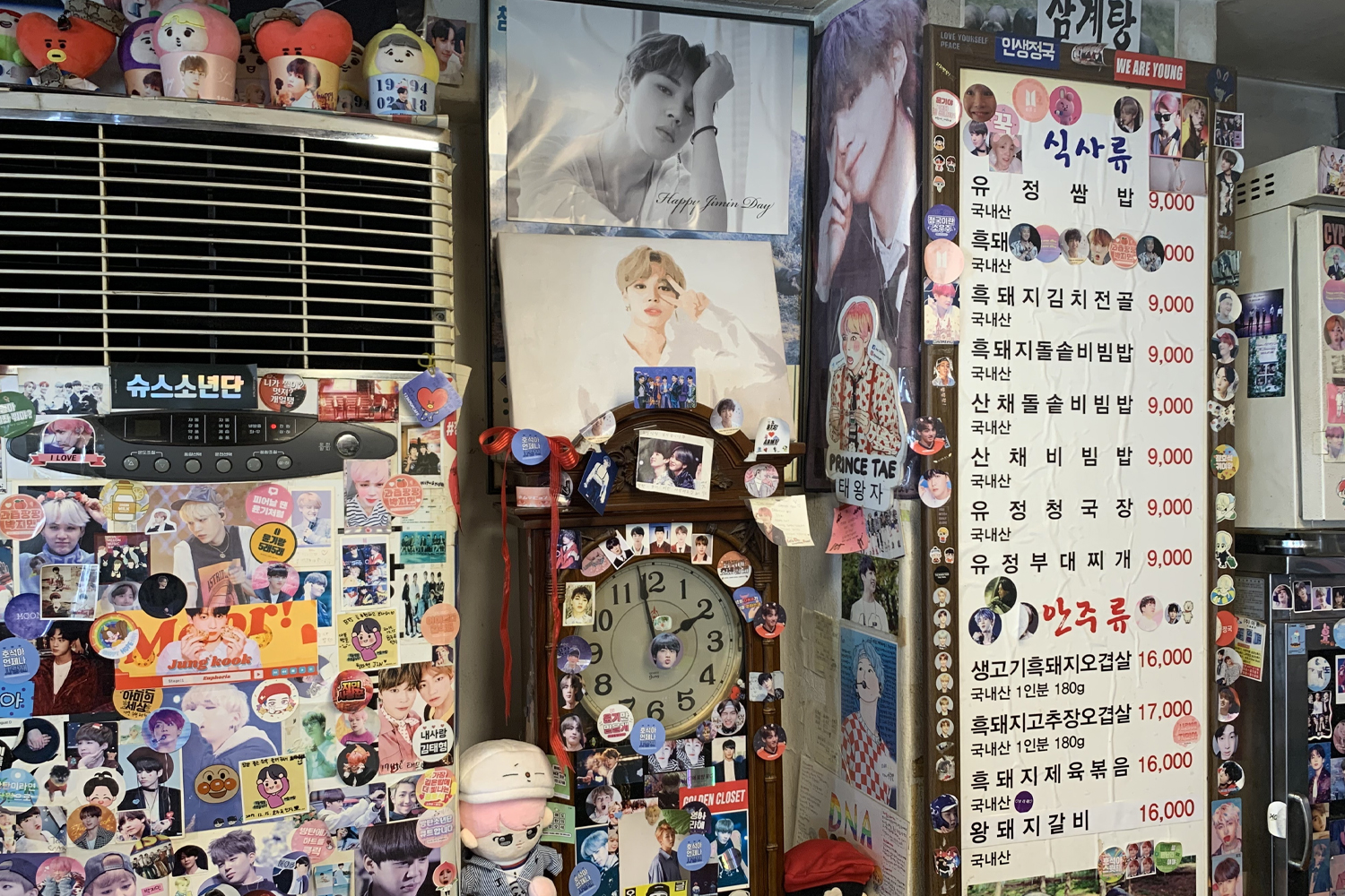 Yoojung Sikdang BTS stickers and posters on wall