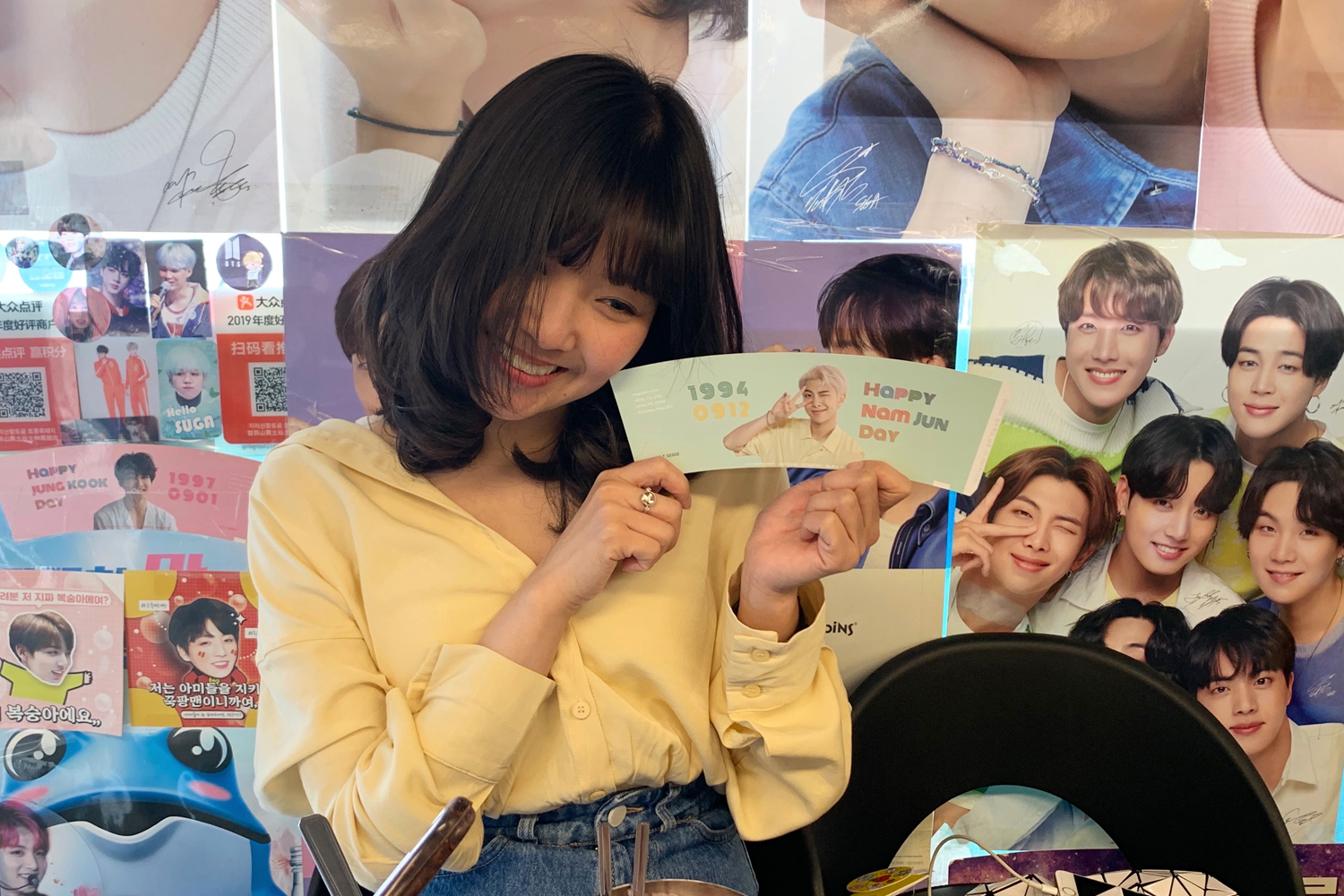 Yoojung Sikdang girl posing infront of BTS wall