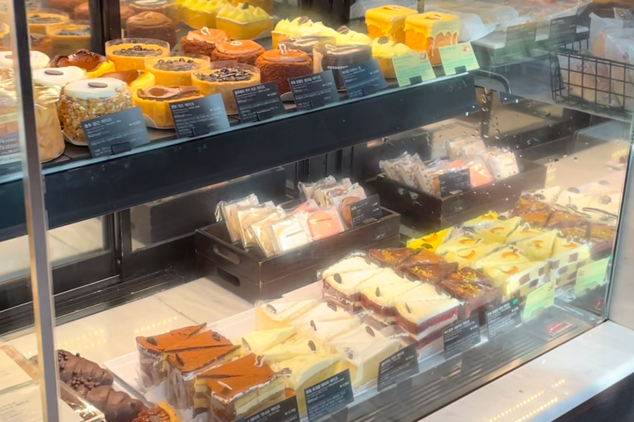 food case at Starbucks Korea with cakes, and macarons