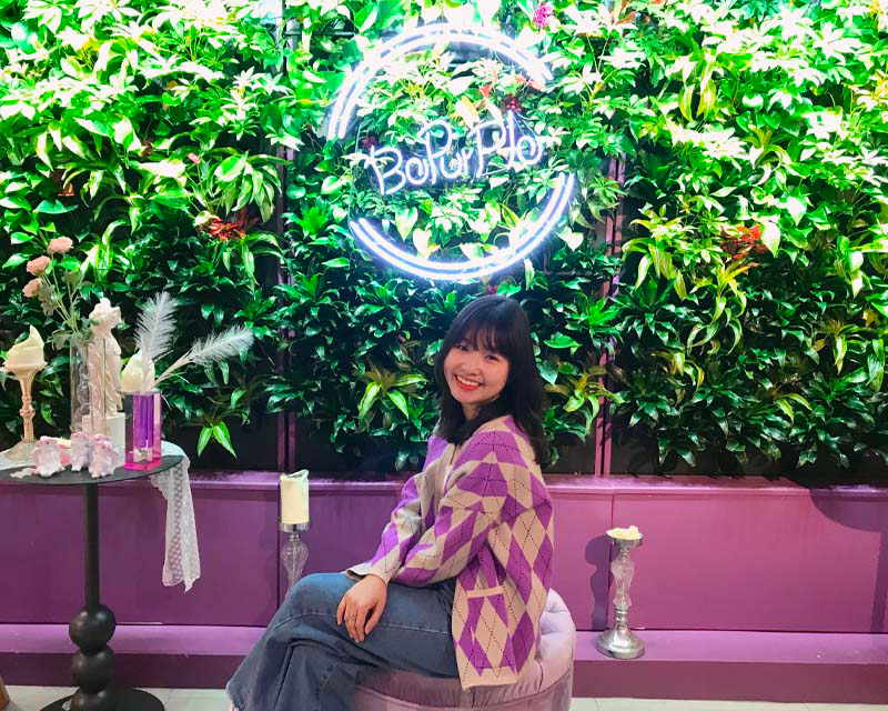 Be purple cafe neon sign