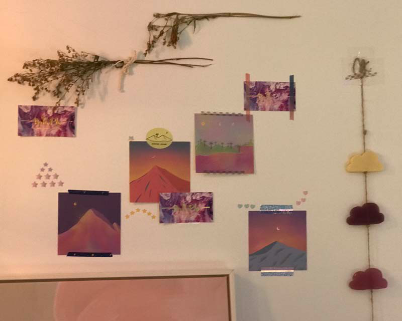 Be purple cafe photo cards on wall