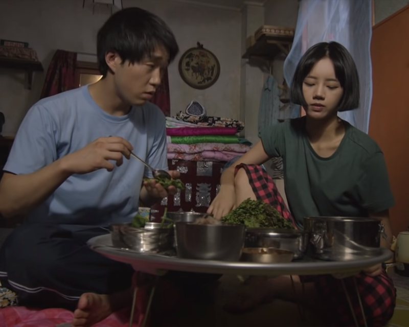 Reply 1988 sitting on the floor eating