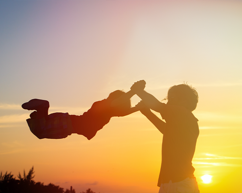 Swinging a child around - Children