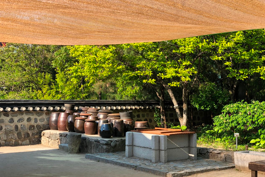 Traditional Hanok structures at Namsan Hanok Village showcasing authentic Korean architectural lineage.