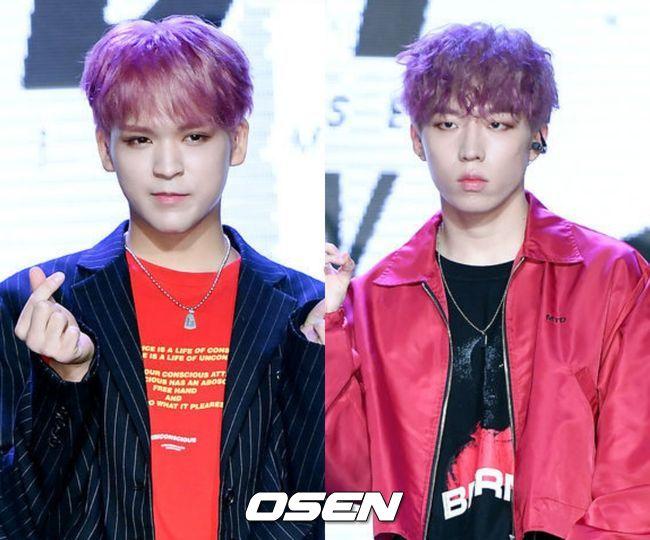 黒と赤い衣装を着た二人の韓国のK-POPアイドル「OSEN」ロゴ入り