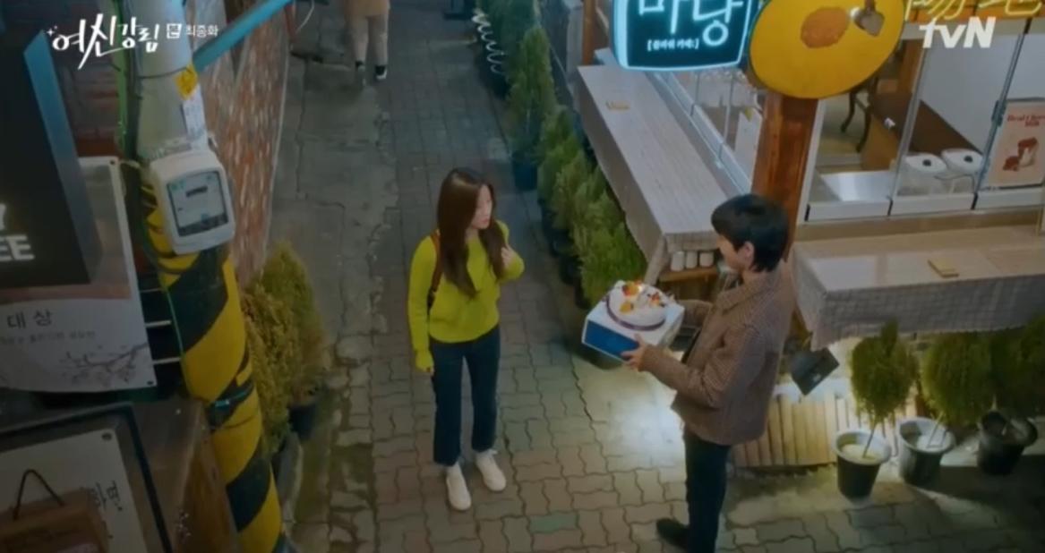 Ju-kyung in True beauty being presented with a cake