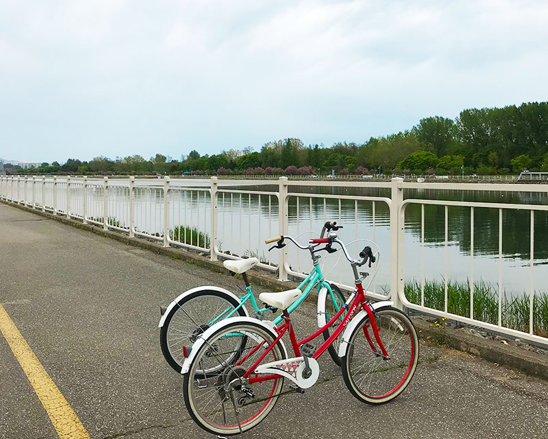 two bicycles near the river at Misari Speedboat Park