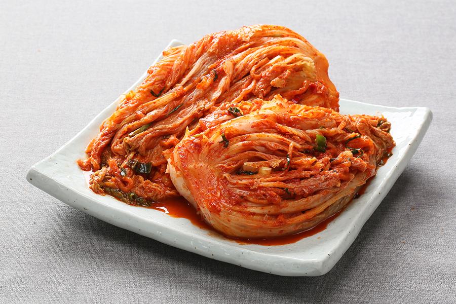 cabbage kimchi on white plate