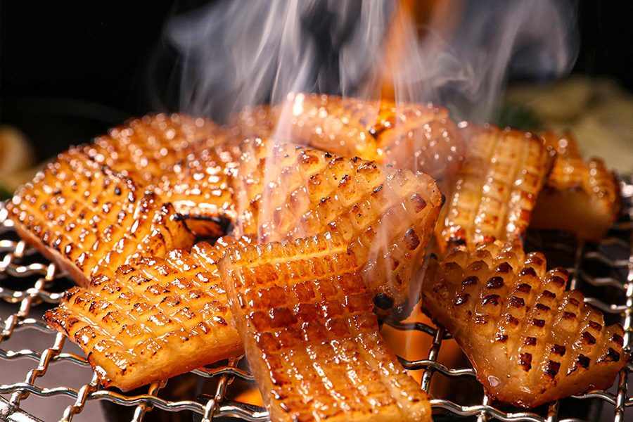 grilled pork rinds on grill (돼지껍데기)