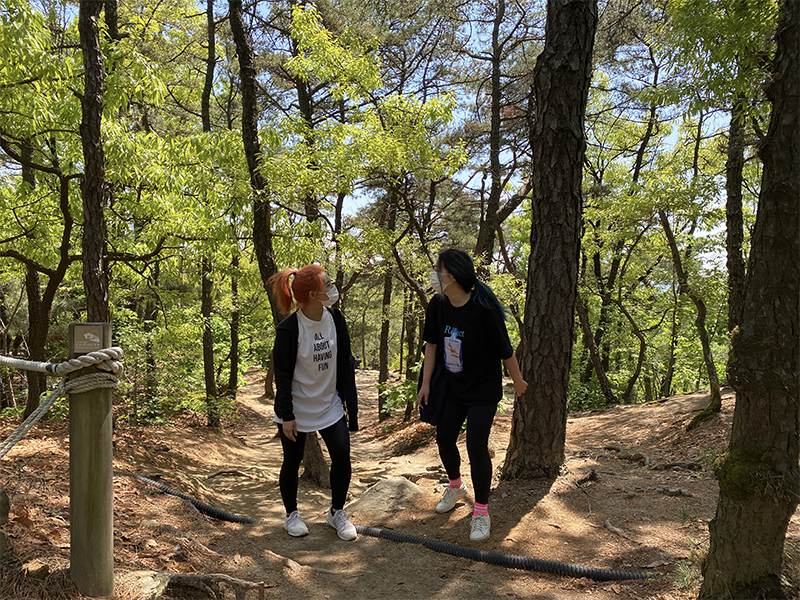 Two women hiking up Achasan, Seoul