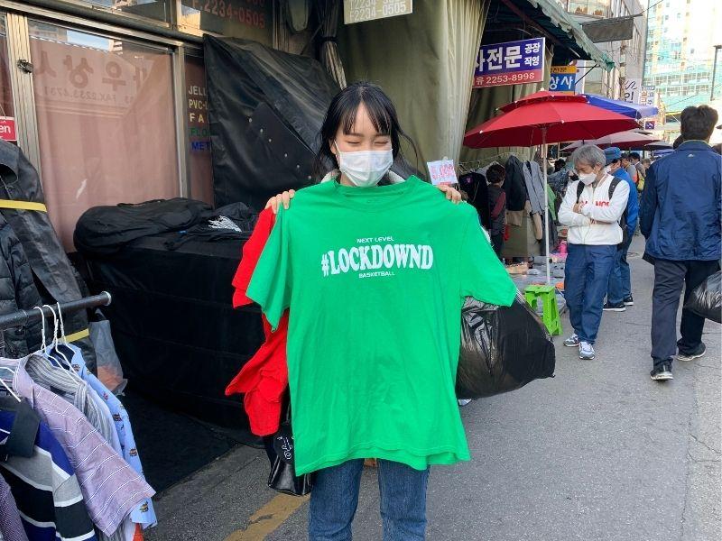 SUGA BTS green shirt at Seoul Folk Flea Market