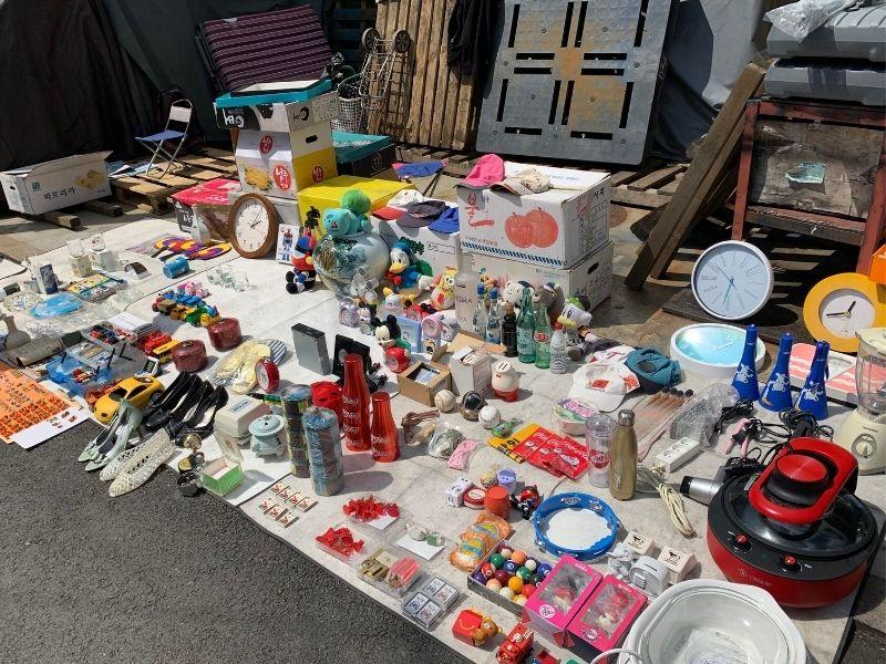 Seoul Folk Flea Market vintage products on the floor being sold