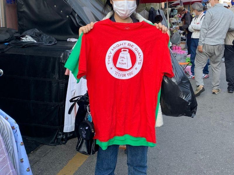 J-Hope red shirt recreating outfit from Seoul Folk Flea Market