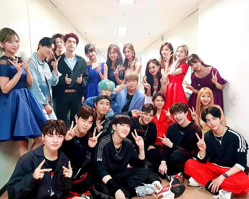 JYP artists group photo in the hallway