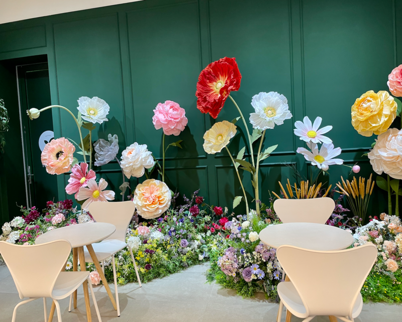 Flowers and white seats at Bites N Flowers by Naked Hongdae