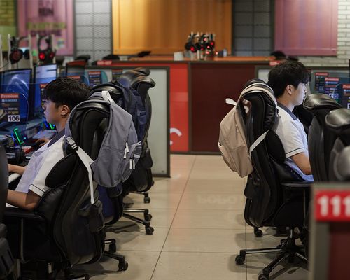 Korean students playing games on the computer at PC bang