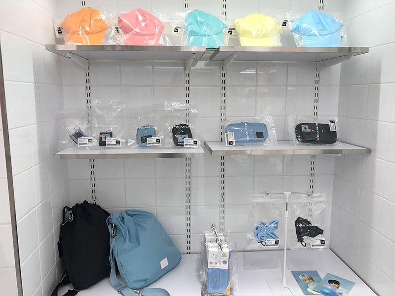 TREASURE hats and merchandise on display at YG the SameE cafe