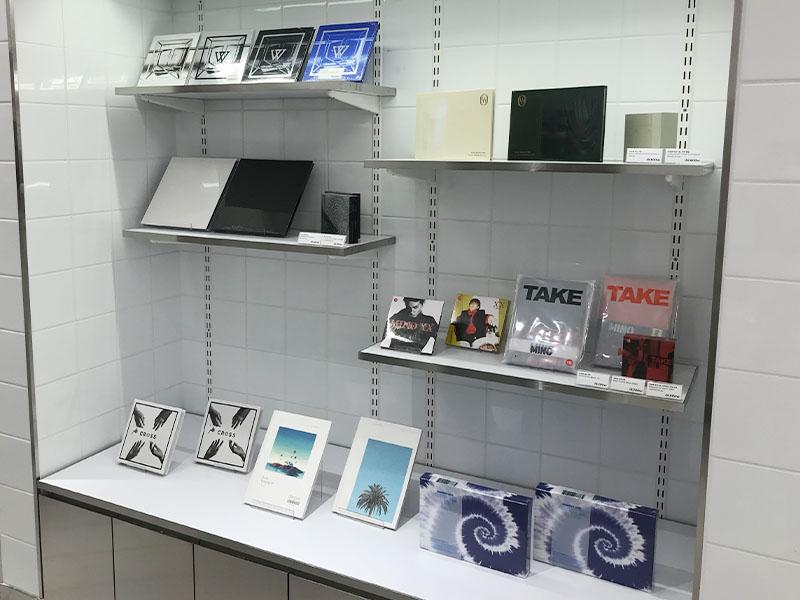 YG Artists merchandise on display at YG the SameE cafe