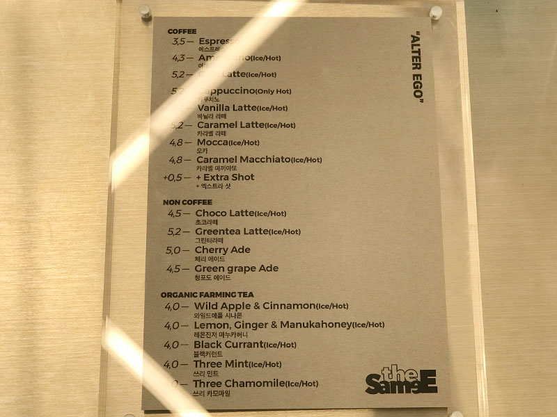 YG the SameE cafe menu on the wall