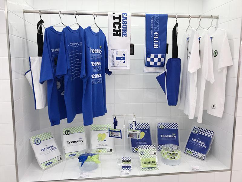 TREASURE merchandise on display at YG the SameE cafe