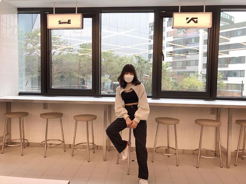 girl sitting infront of the views at YG the SameE cafe