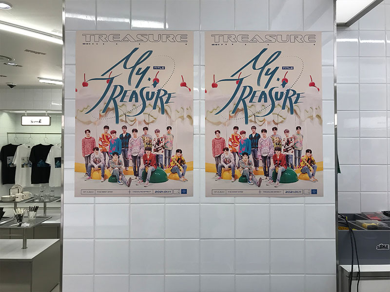 TREASURE poster on the wall at YG the SameE cafe