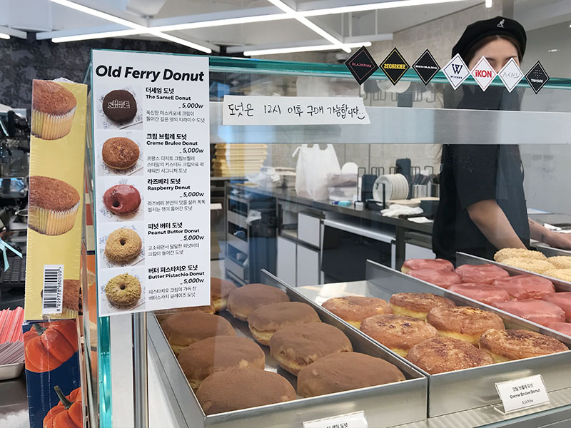 YG the SameE cafe donuts on display and menu