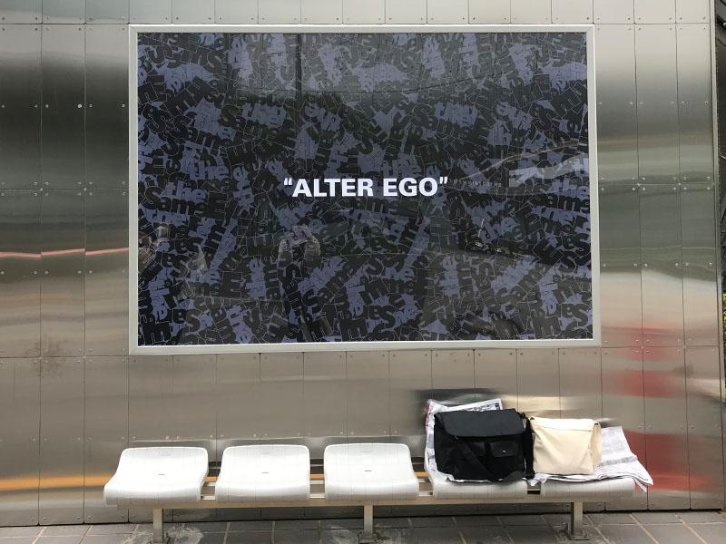 YG the SameE cafe ALTER EGO sign on the wall