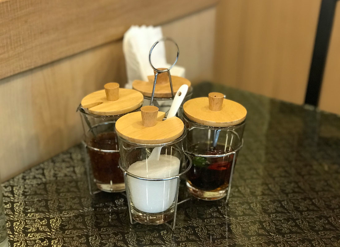 seasonings on the table at Amazing Thailand