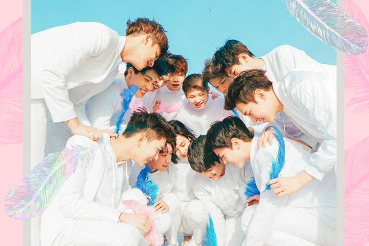 SEVENTEEN members dressed in white and holding colorful feathers against a blue sky, illustrating a fresh and vibrant concept from their '少年三部曲' series.
